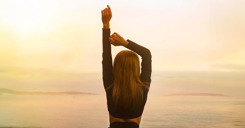 a woman embraces pcos healthy lifestyle